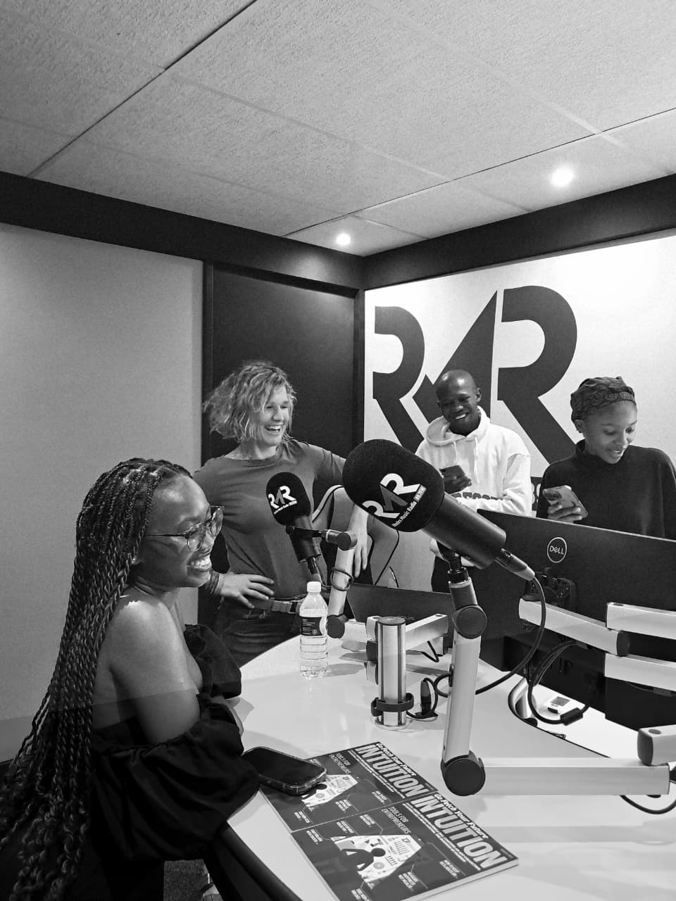 The Playdate team laughing in the RMR studio