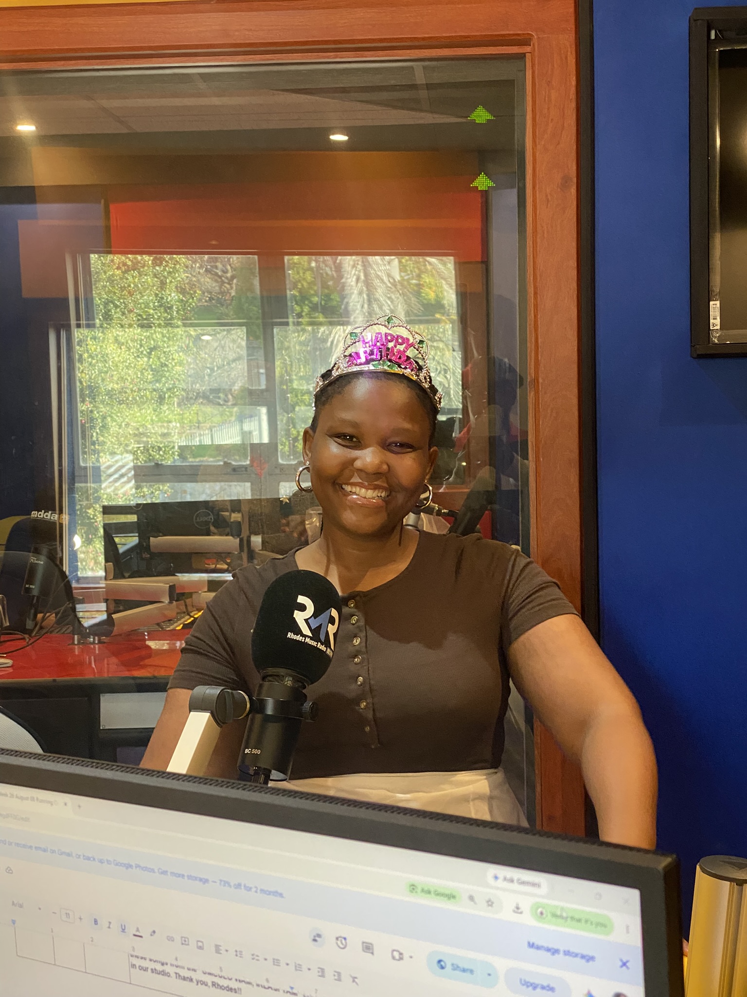 A Playmate smiling in the studio