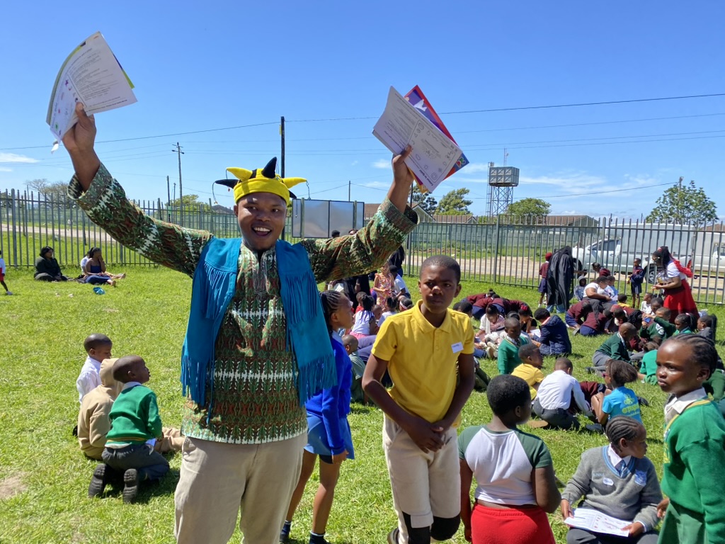 A storyteller in a jester costume