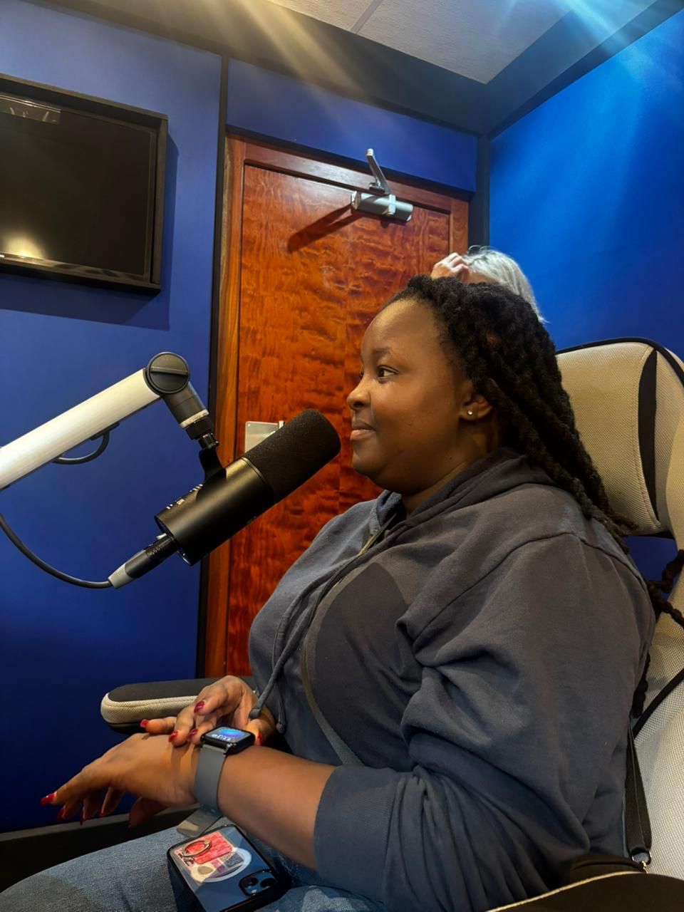 Rethabile Sindi at the mic in the RMR studio