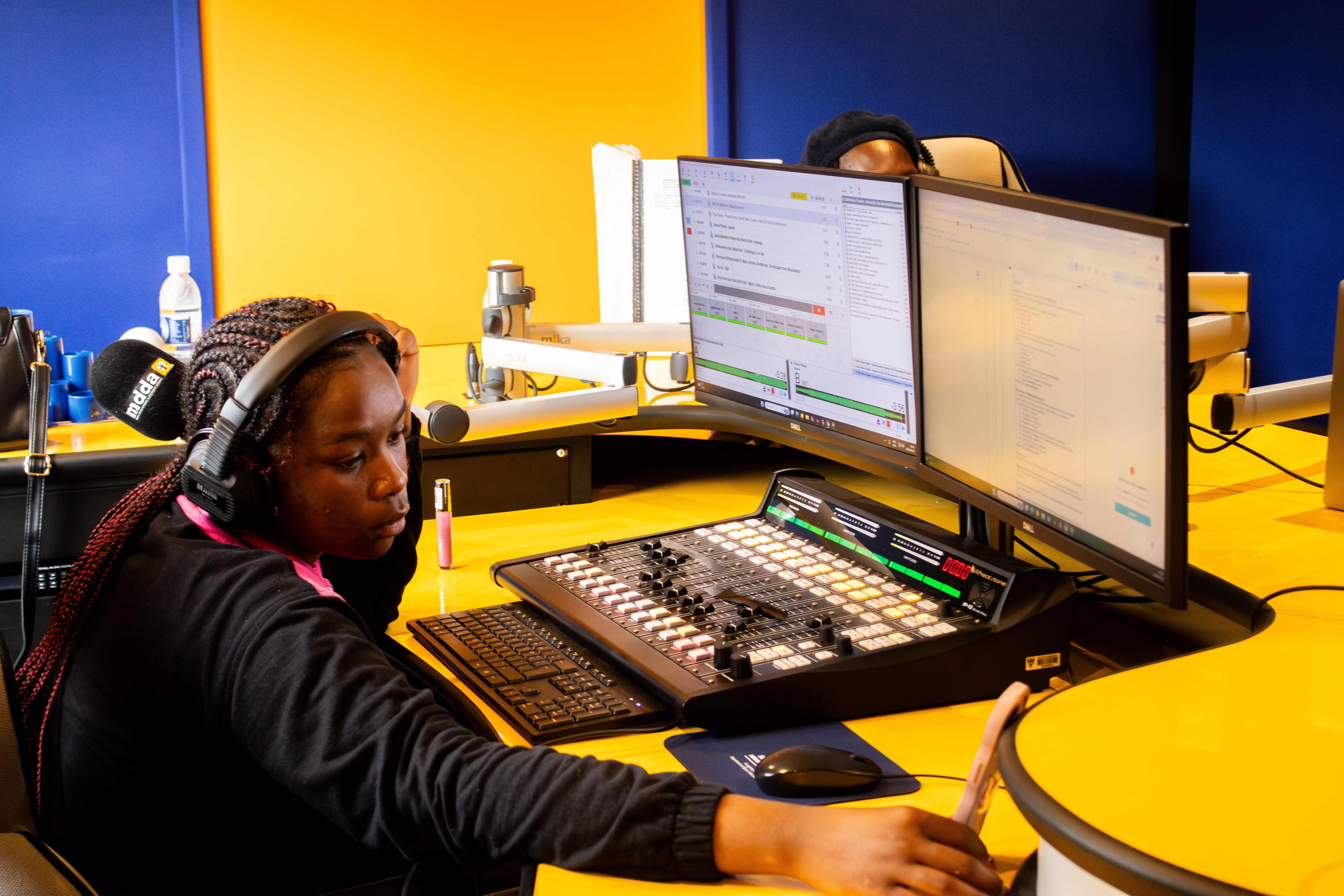 A young presenter at the RMR mixing desk